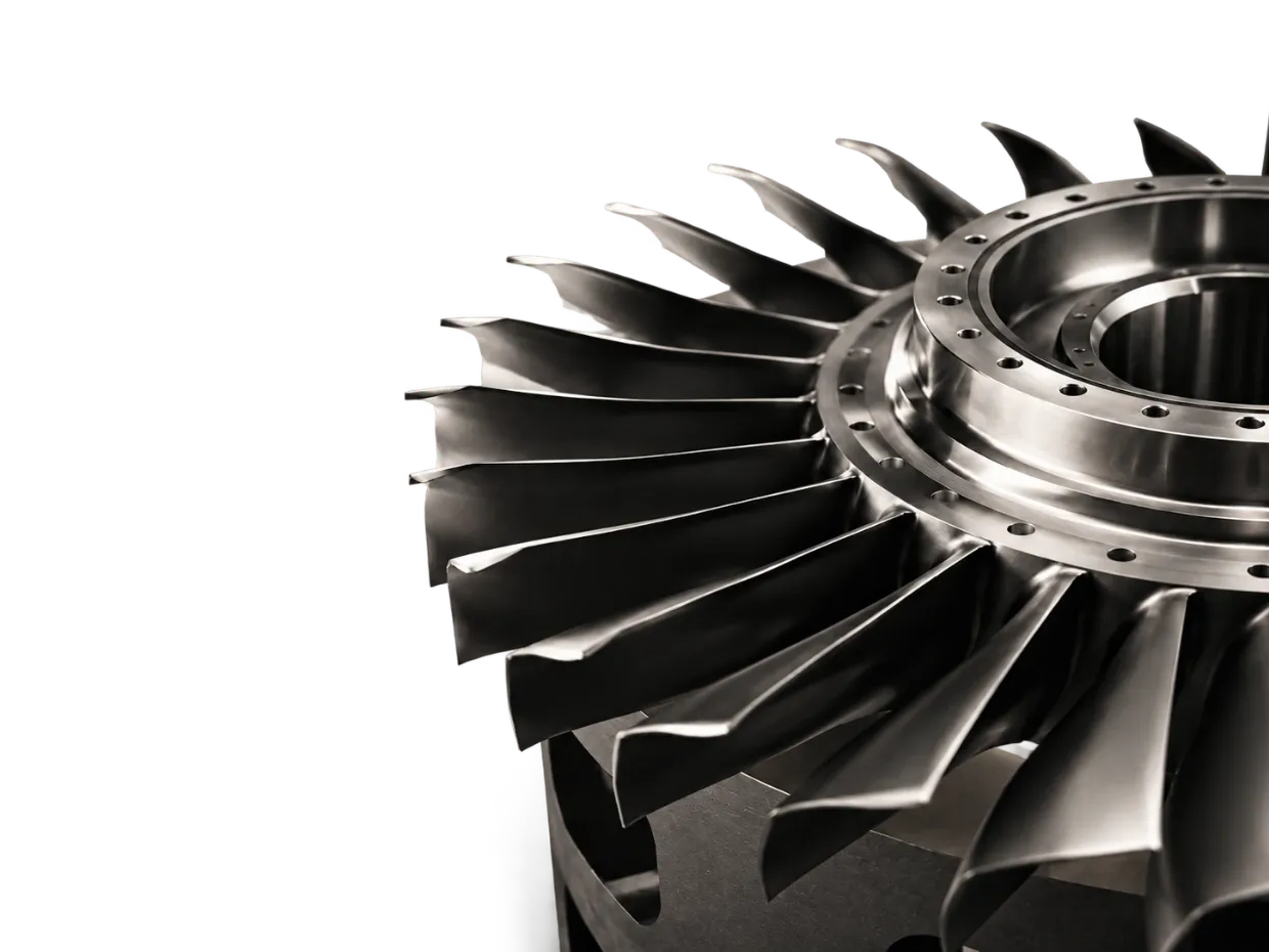 Large precision-machined turbine rotor with complex blades